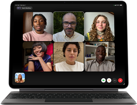 iPad Air, attached to Magic Keyboard, Black color, Group FaceTime call on screen