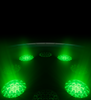 Back of Apple Watch Ultra 4, titanium case, black color, multiple round sensors with glowing green LED lights