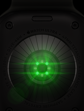Back of Apple Watch Ultra 4, titanium case, black color, multiple round sensors with glowing green LED lights